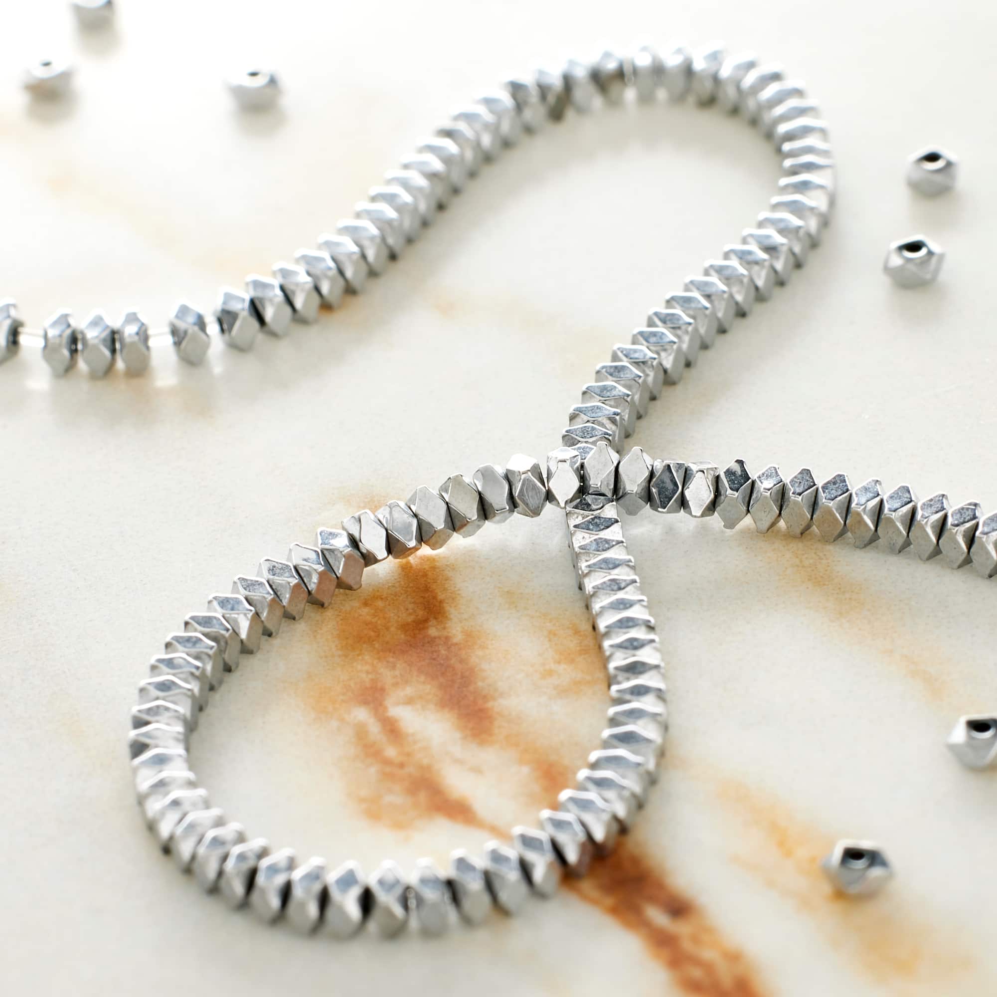 Rhodium Hematite Faceted Beads by Bead Landing®, 2mm